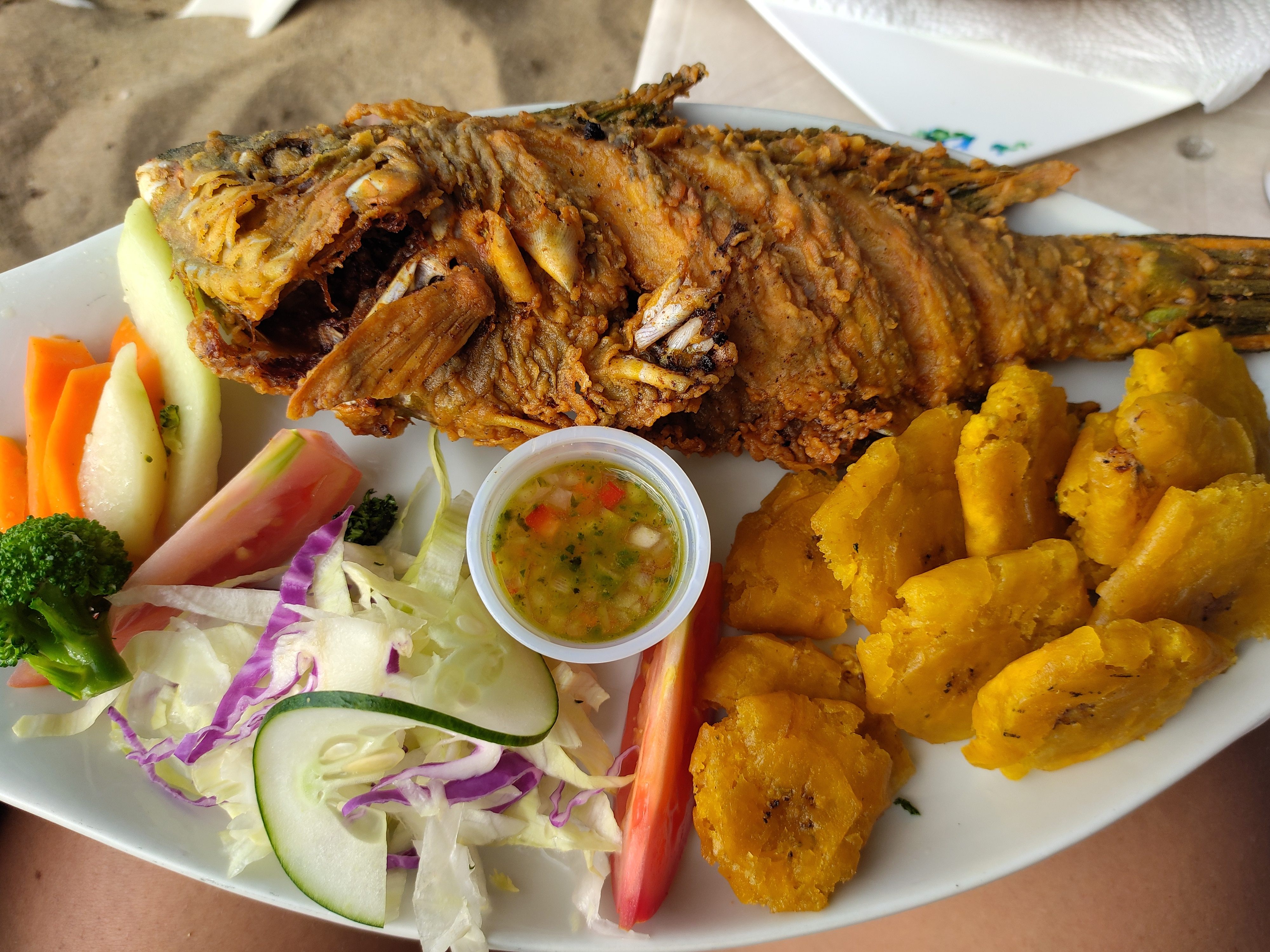 Fried fish and tostones at a beachside restaurant in the Dominican Republic