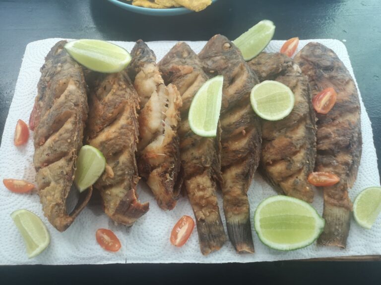 fried whole fish lime cherry tomatoes home cabarete