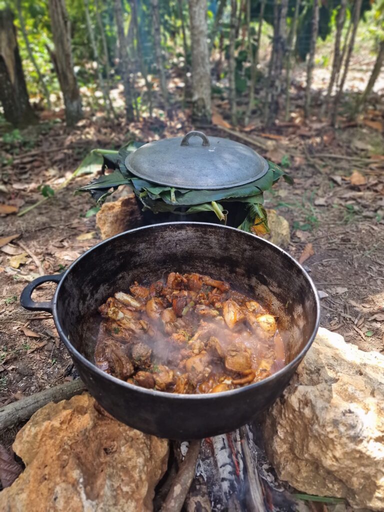 iron pot meat stewing wood fire campo villa riva duarte