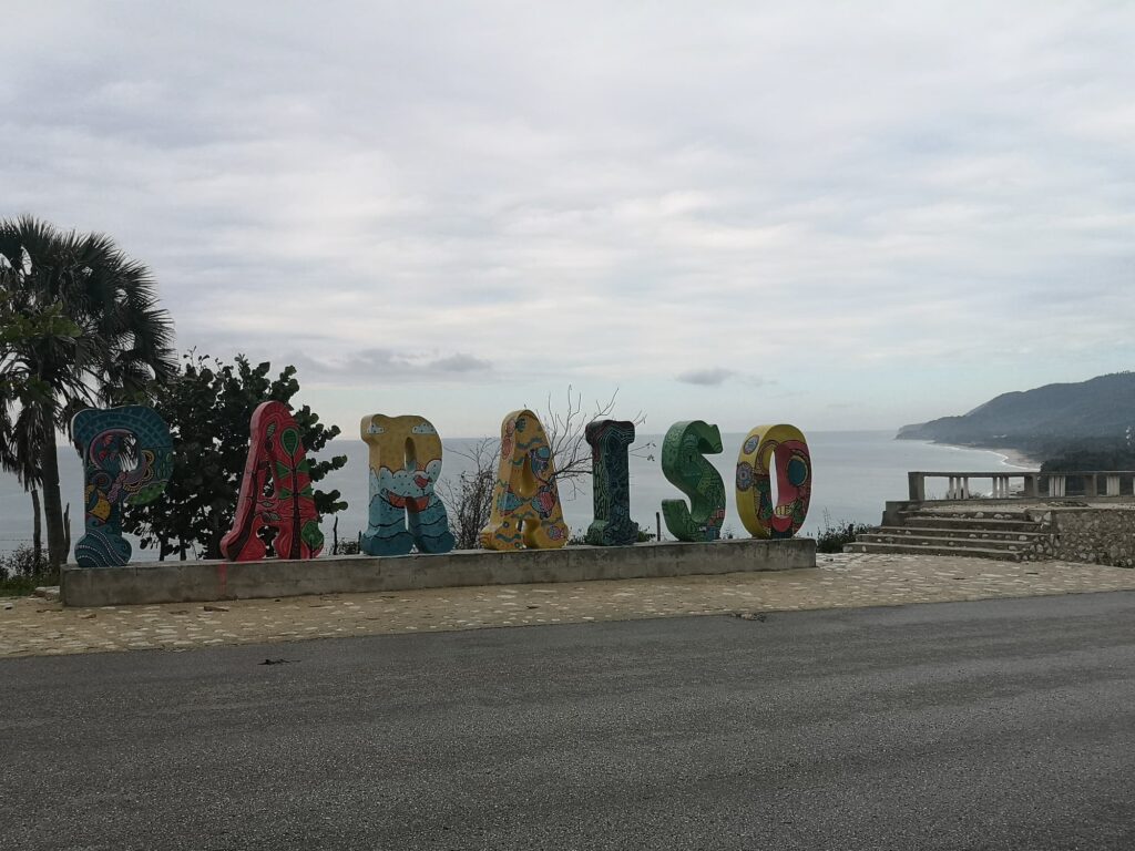 paraiso town colourful sign sea coastline barahona dr