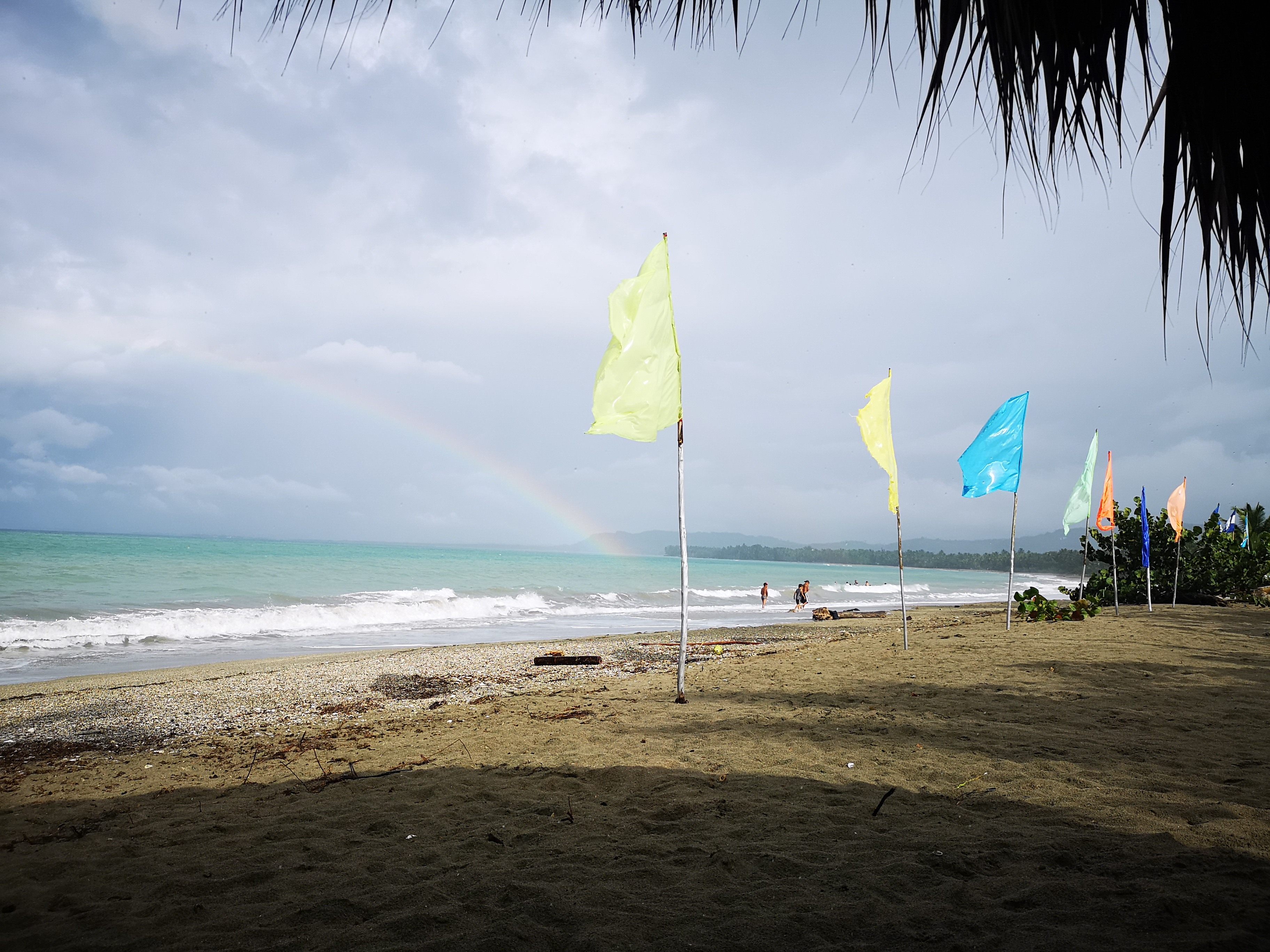 Rainbow over the sea at Playa Rogelio on the Dominican Republic north coast