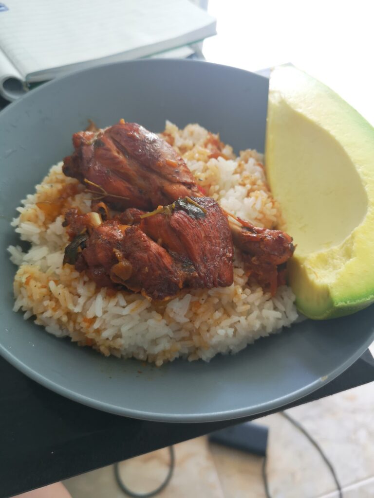 pollo guisado rice avocado plate cabarete