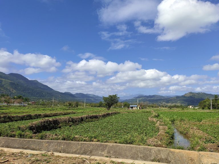 agricultural campo fields irrigation canal mountains