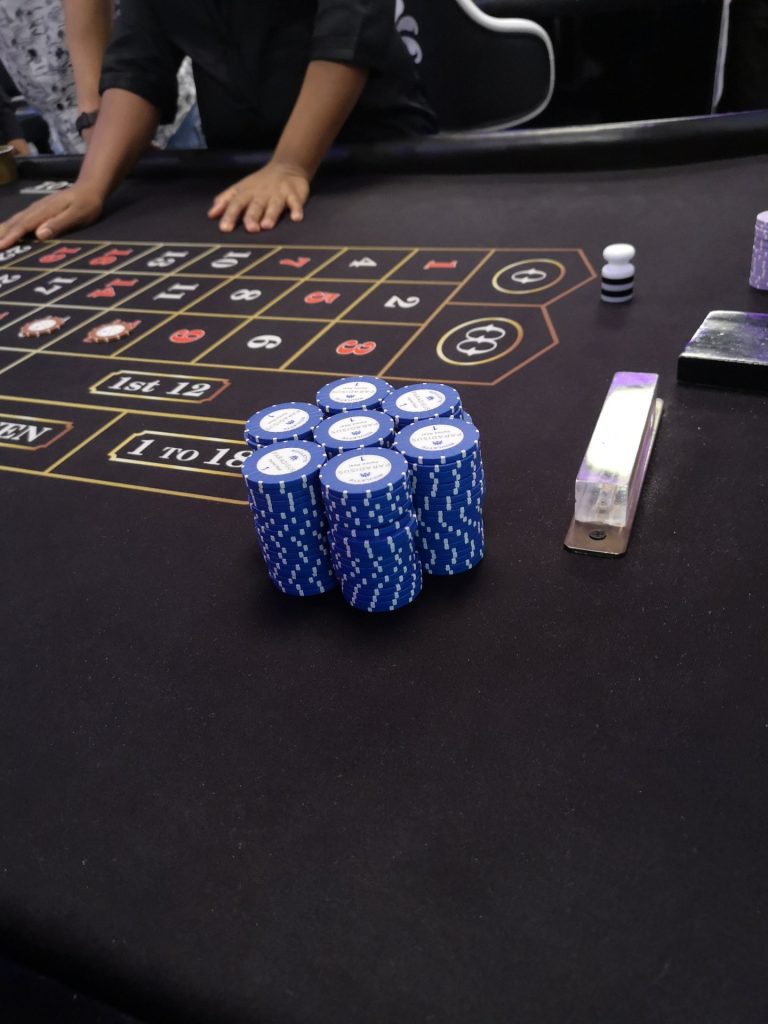 casino roulette table blue chips stacked punta cana