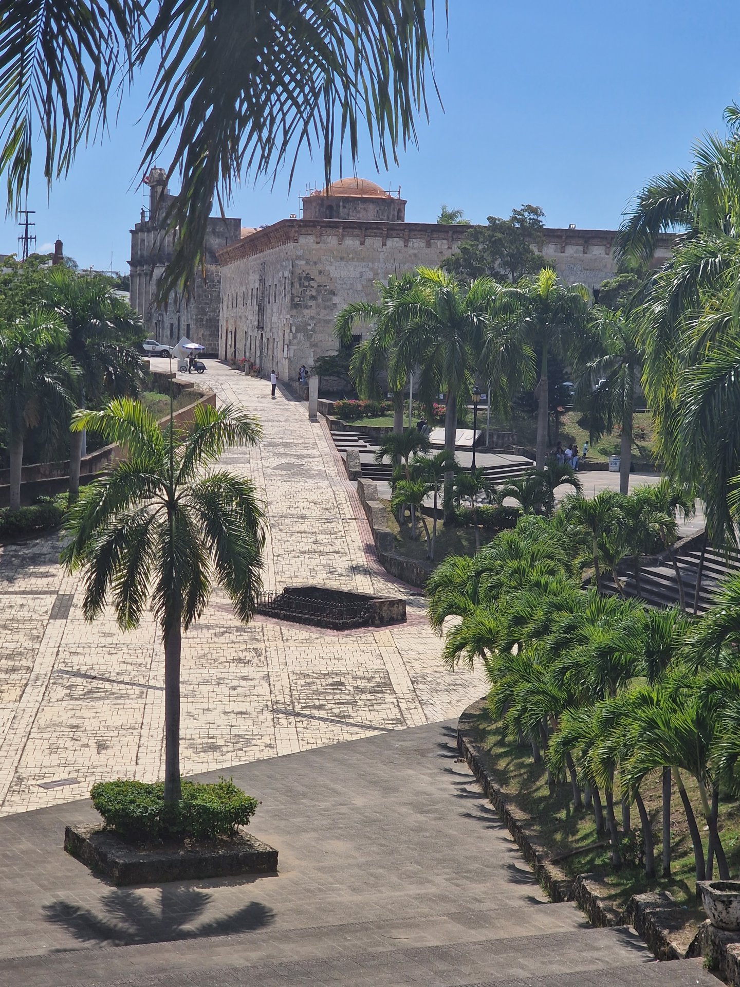 Colonial square with palms and cathedral in Zona Colonial, Santo Domingo