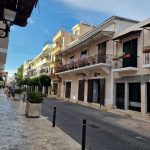 colonial street white balcony buildings morning zona colonial santo domingo
