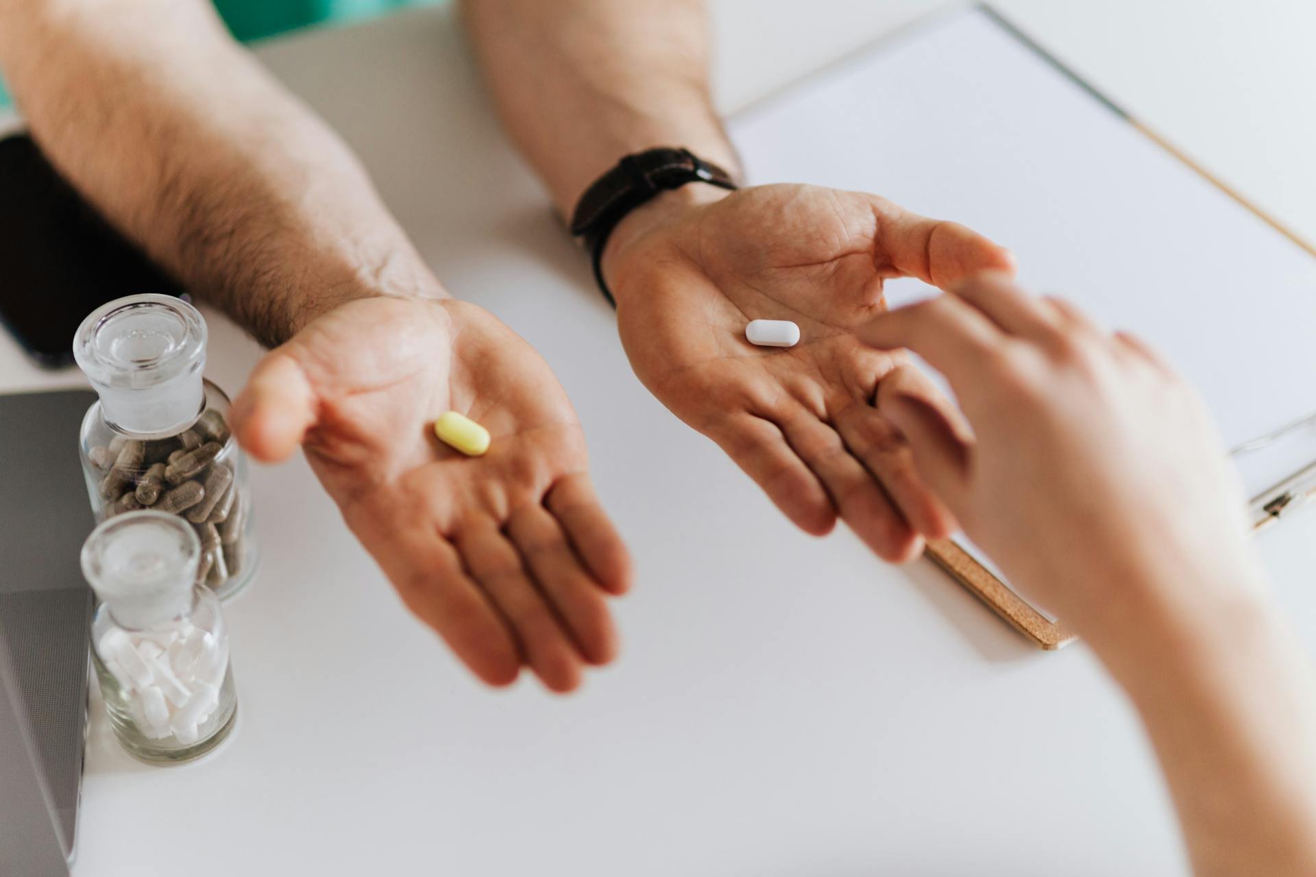 Doctor giving medication to a patient in a clinic, pharmacy in the Dominican Republic