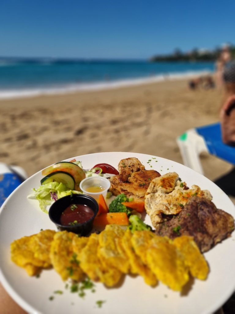 grilled fish tostones salad plate beach restaurant sosua