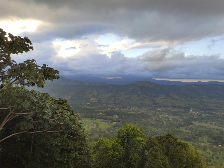 jarabacoa town valley dramatic storm clouds mountain panorama
