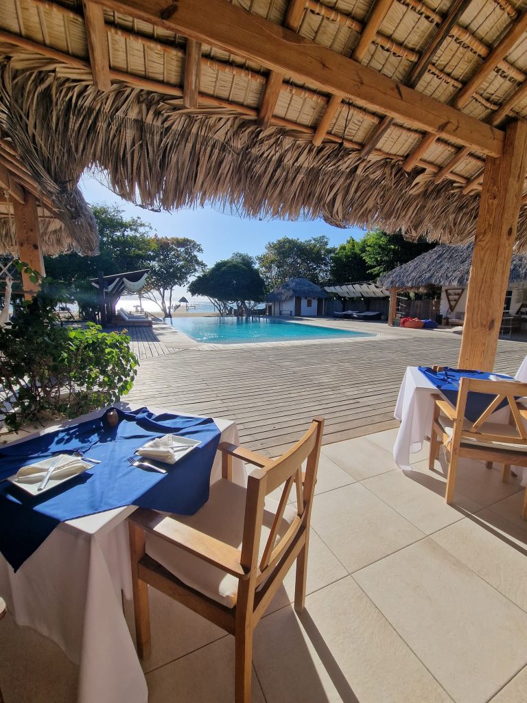 lodge restaurant thatched roof pool punta rucia lodge
