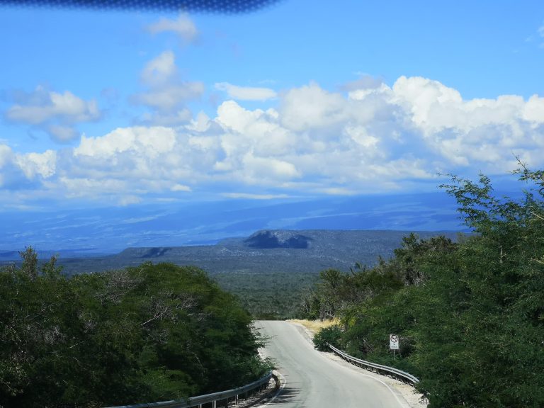 mountain road winding arid valley view southwest