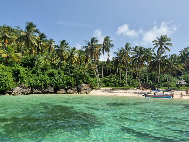 playa fronton beach palms moored boats turquoise water samana
