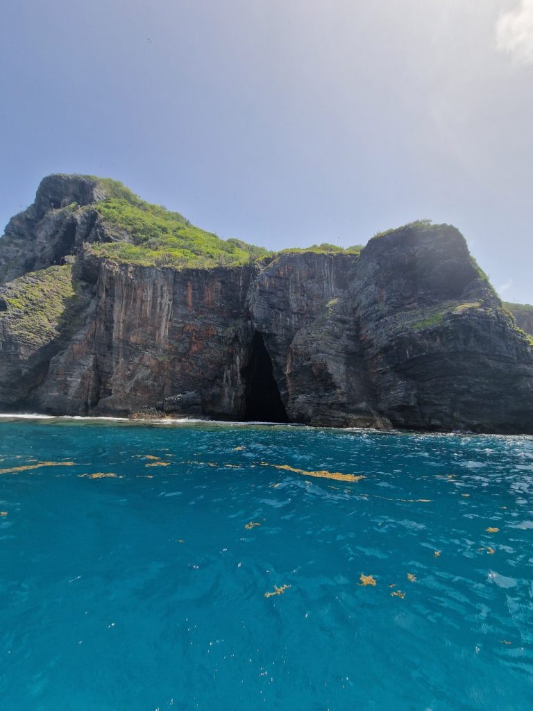 playa fronton sheer rock cave turquoise water from sea samana