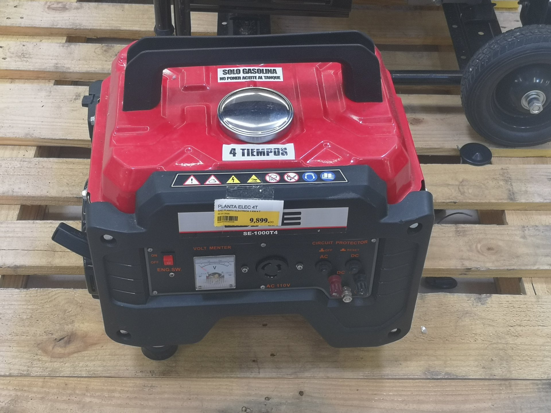 Portable petrol generator for sale in a Dominican Republic hardware store