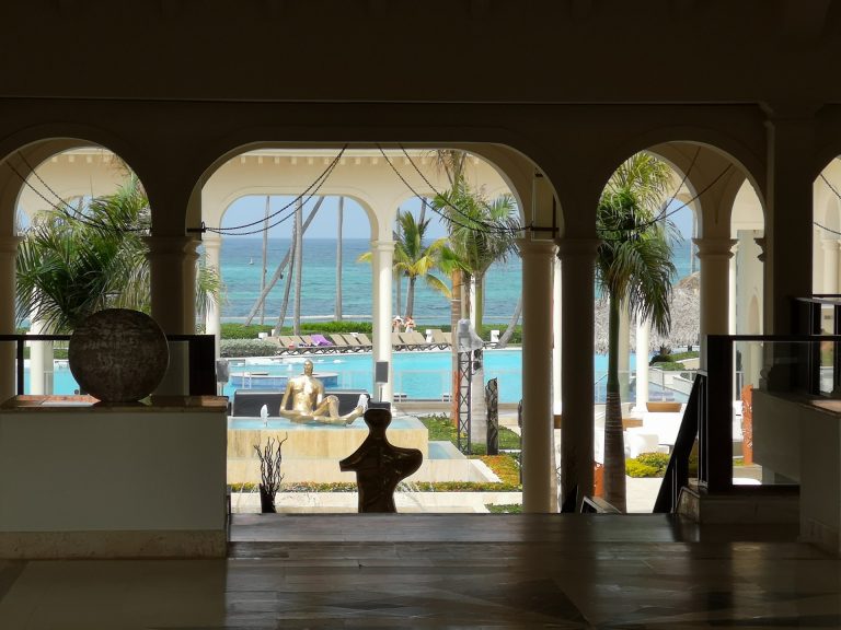 resort lobby arched columns pool ocean view gold sculpture bavaro punta cana
