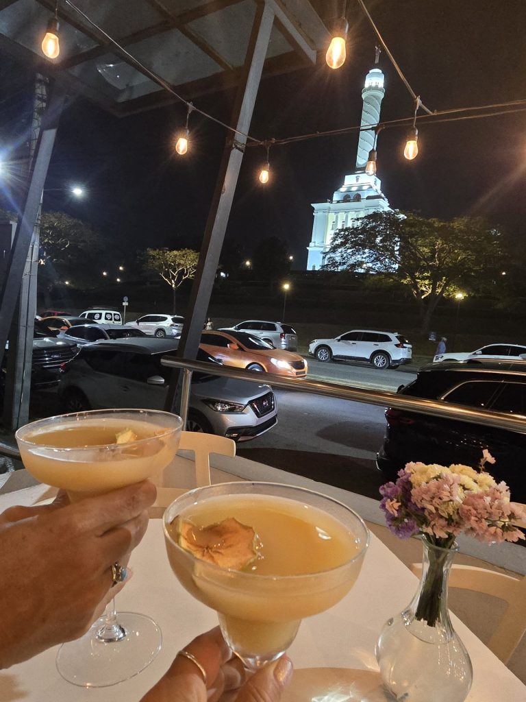 rooftop cocktails monumento view night santiago