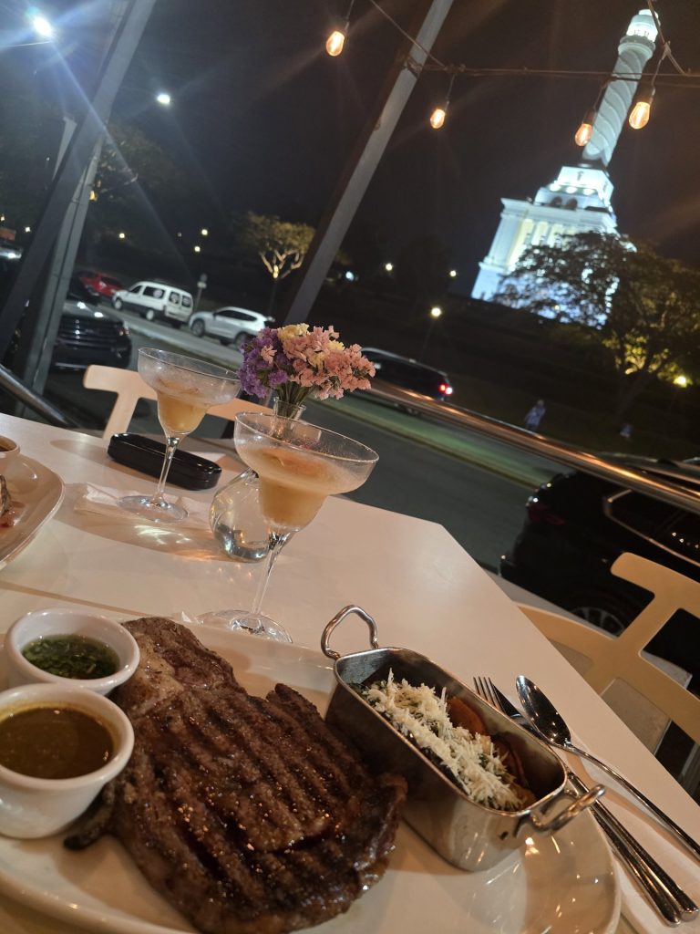 rooftop dinner steak monumento view santiago
