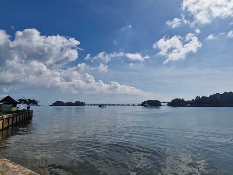 samana bay harbor arched bridge calm water samana