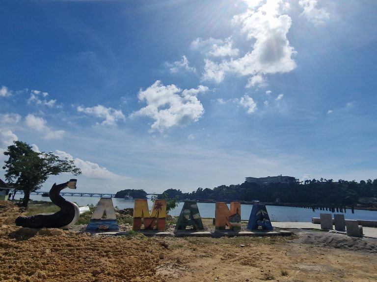 samana town sign waterfront bay bridge samana